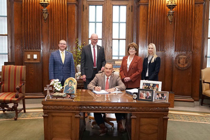 Kehoe signs energy infrastructure bill; opponents protest against potential rate increases