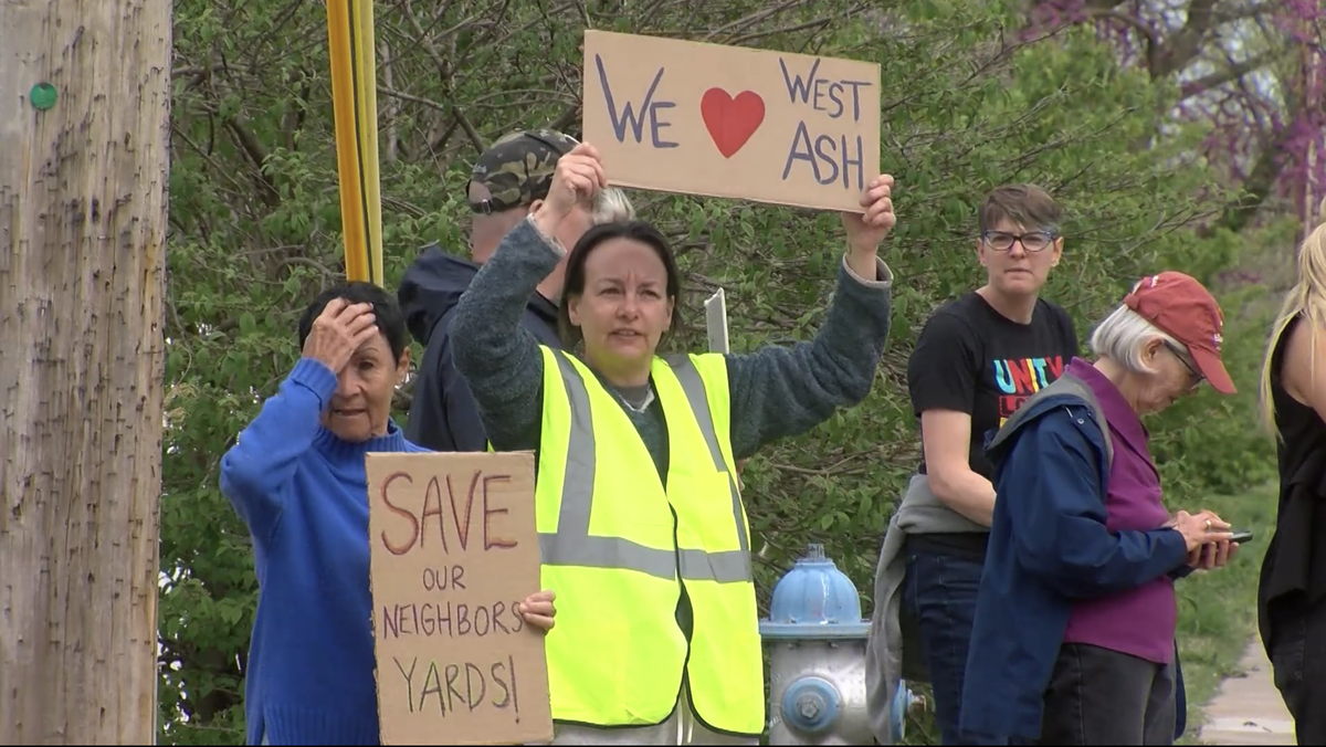 West Ash Street residents continue push against removal of trees in neighborhood