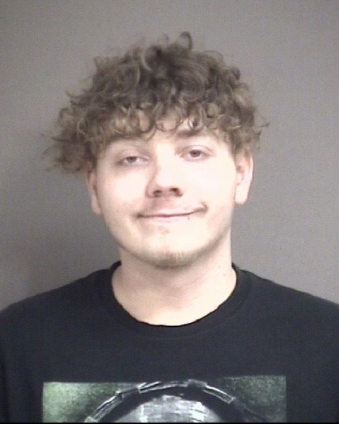 Man charged with assault after shot fired in Columbia parking lot