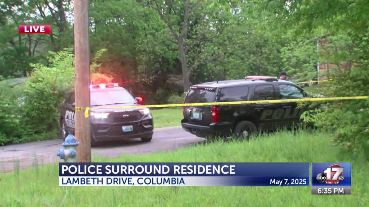 2 people with warrants arrested after standoff in neighborhood north of I-70