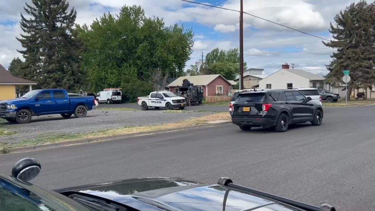 Police surround SW Redmond home