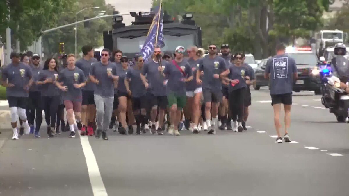 Law enforcement carries Special Olympics ‘Flame of Hope’ torch through Santa Maria