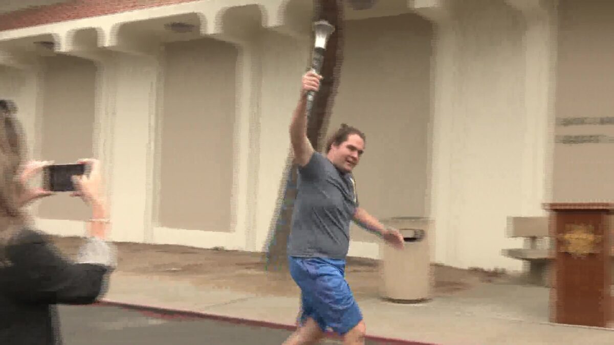 Special Olympics Torch Run Supporters Share Funds from Local Events