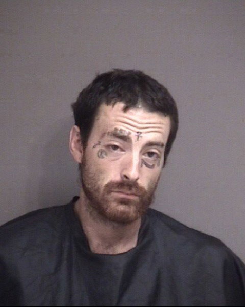 Man accused of using ax to threaten man at Business Loop 70 Taco Bell