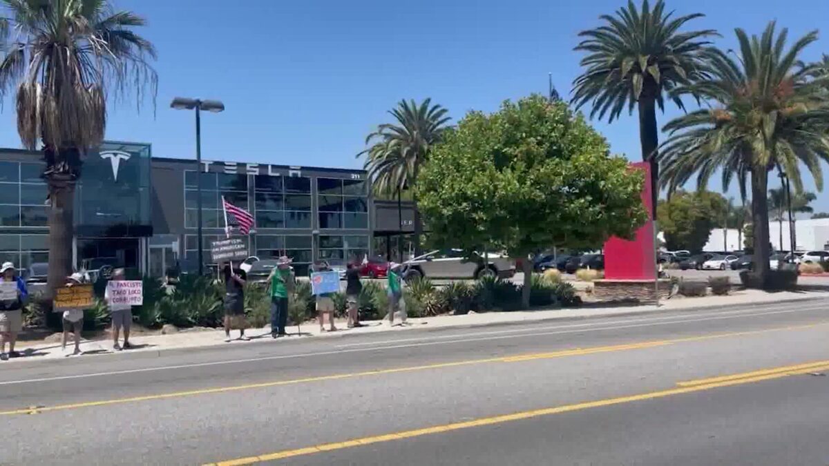 Protesters outside Tesla dealerships not Backing Down