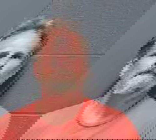 Man accused of crashing into police vehicles while having child in backseat