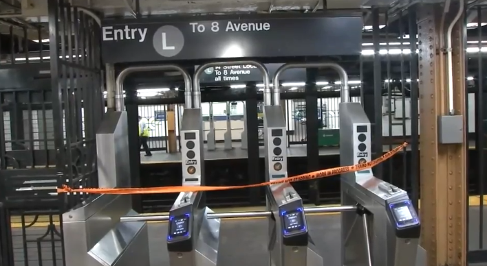 A 24-year-old off-duty NYPD officer landed on the L subway line tracks after being allegedly pushed by 28-year-old Aaron Walker