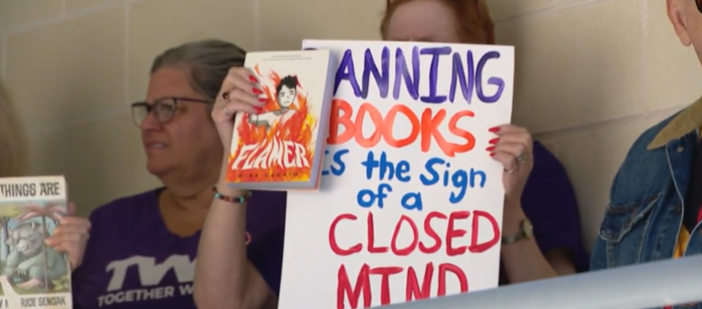 The protest comes after the board's decision to remove "Flamer" from school libraries across Harford County.