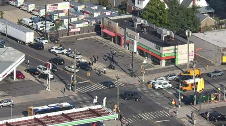 Police on the scene after a 13-year-old was shot in the head in Queens on Sept. 22.