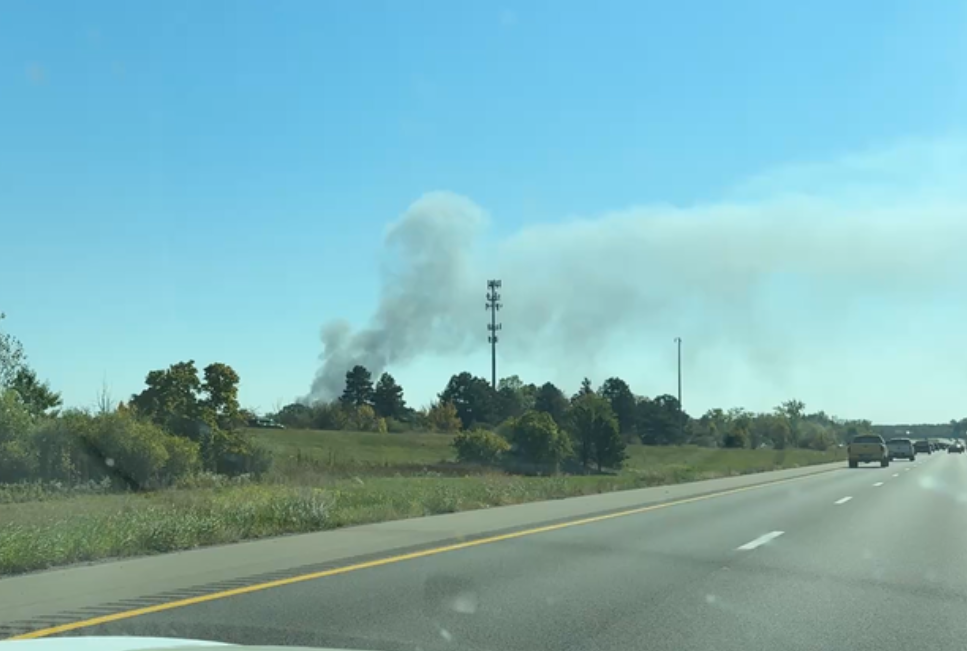 Smoke rises from The Church of Jesus Christ of Latter-day Saints in Grand Blanc
