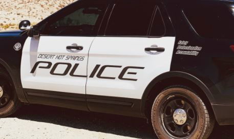 Motorcyclist hospitalized after crash with curb