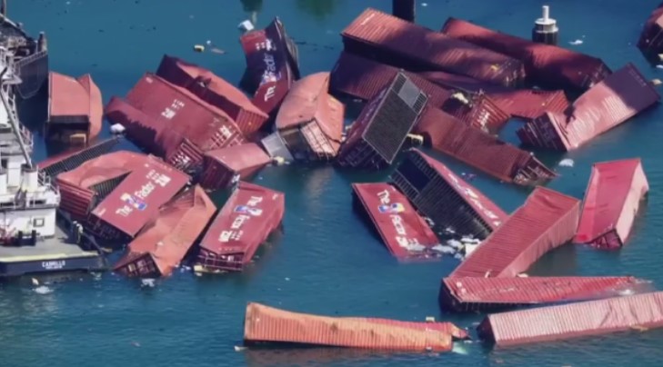 An apparent accident at the Port of Long Beach left dozens of shipping containers in the ocean water on Tuesday