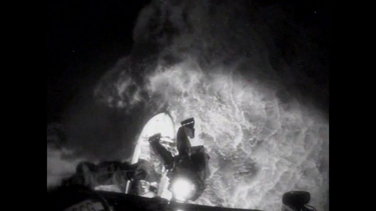 Coast Guard helicopter crew rescues fisherman after vessel capsizes off the Oregon coast