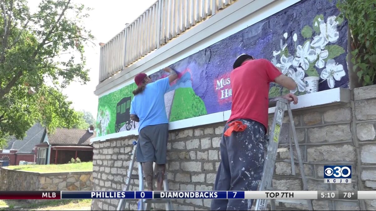 New mural painted outside a home in the Museum Hill Historic District