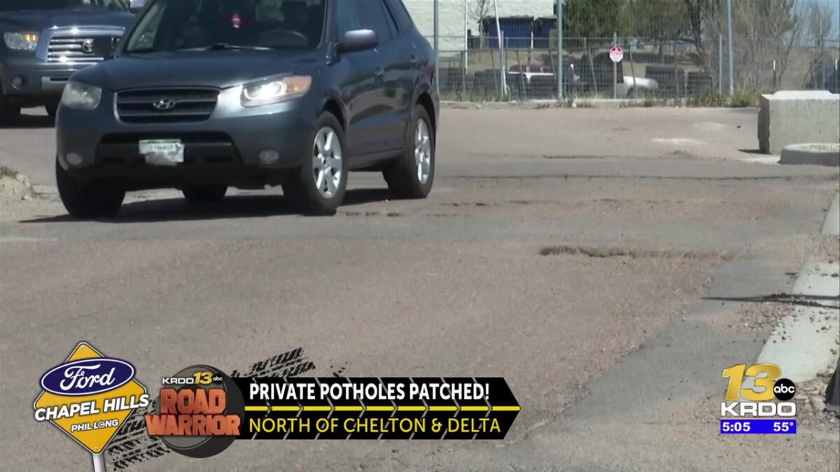 Longtime problem potholes on access road behind several southeast Colorado Springs businesses finally filled