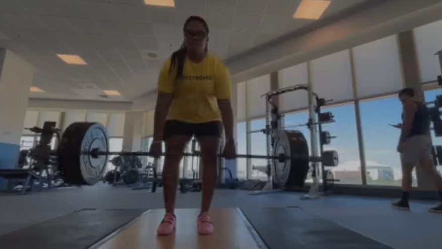 LaShae Rolle has powered her way through breast cancer treatments and is now using her power lifting workouts as part of a research study.