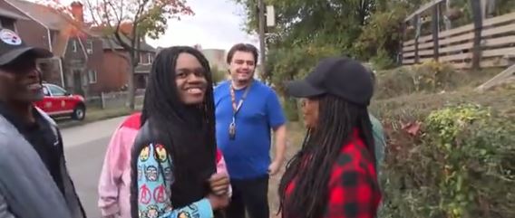 Xaiveyon McMillan Taylor had just stepped off his school bus on North Avenue when he heard a woman screaming that her house had caught fire. The woman