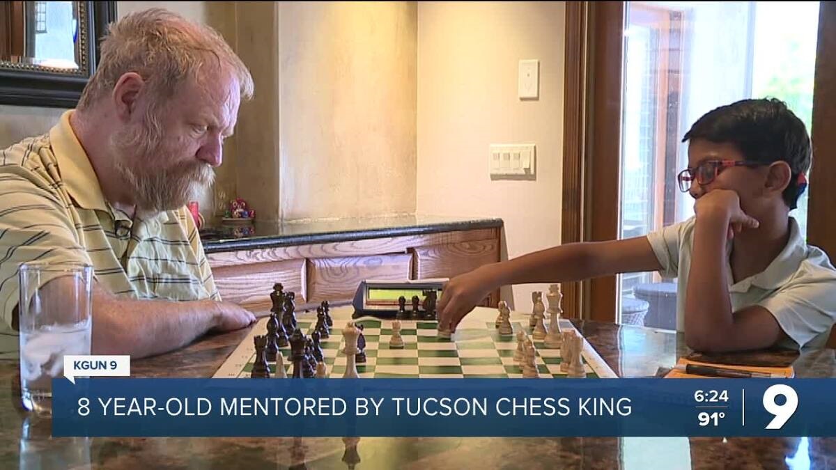 Ken Larsen and Nik Jain play a game of chess.