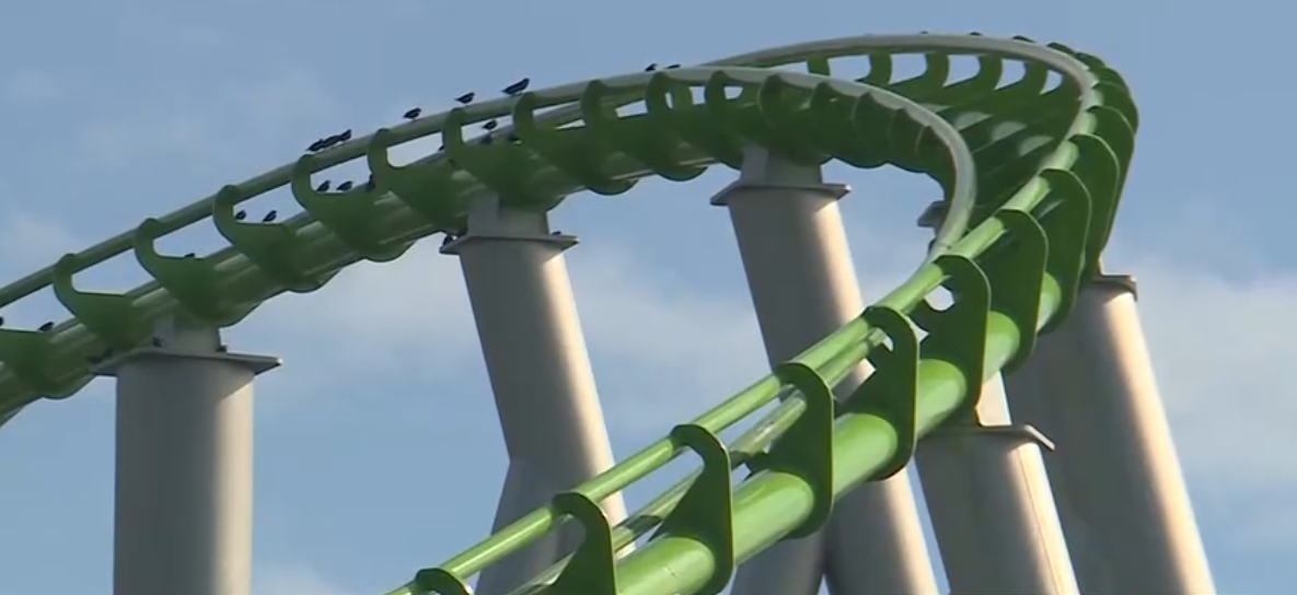 Worlds of Fun visitors say they had to hold down young girls after alleged seat belt malfunction on roller coaster.