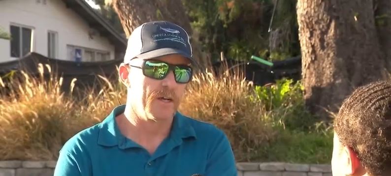 Jason White and Robbie Taylor have lived across the street from each other for more than 20 years. But White says they haven’t spoken in years