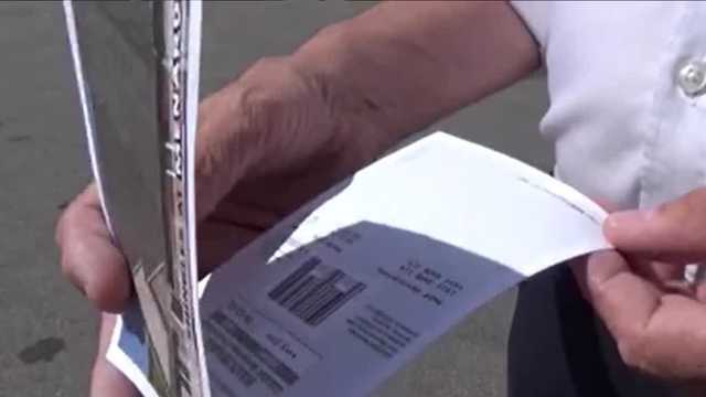 A federal grand jury indicted two postal employees this week