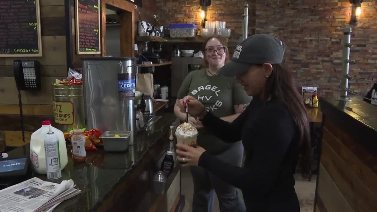A family-owned Baltimore bagel shop is making waves in the college sports world by offering student-athletes something different than cash: free food and genuine mentorship.