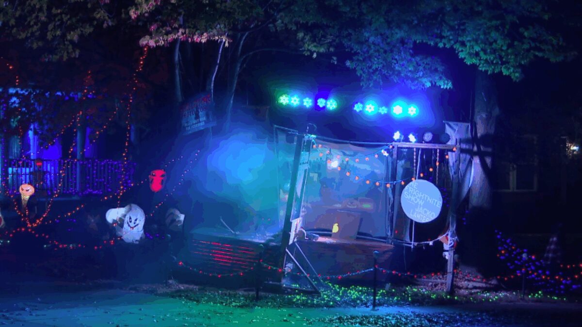 A high school senior who loves Halloween and tech has transformed his front yard into an elaborate Halloween spectacle that's inspiring neighbors to join in the spooky fun.