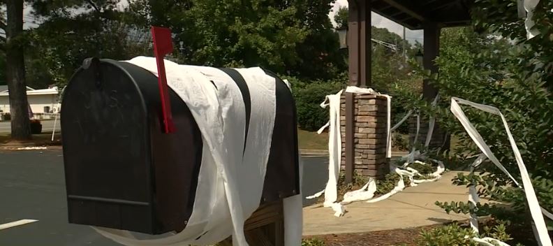 The streets of Heflin are littered with toilet paper along with many homes and businesses. It's a homecoming tradition that grew into something much bigger.