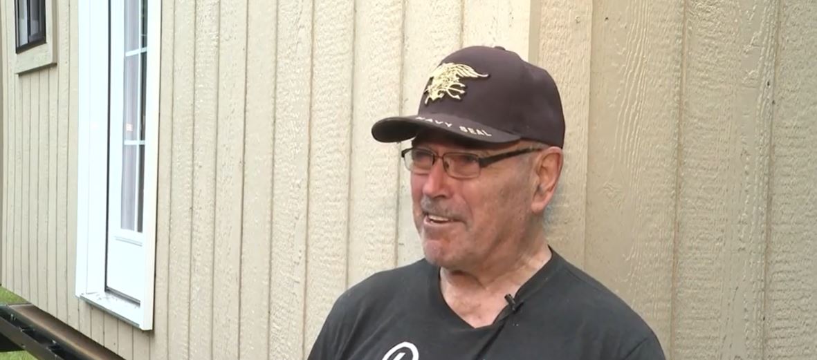 David Hostettor was smiling from ear to ear Tuesday as he was surprised with a brand new temporary tiny home. A year ago
