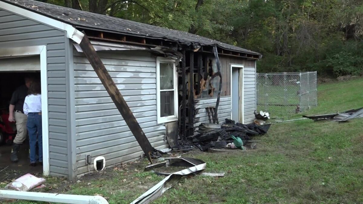 Fire crews contain garage blaze