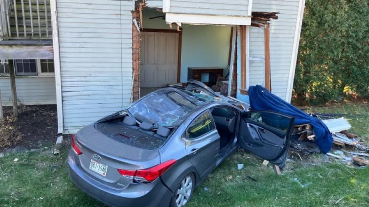 A car carrying 3 coworkers crashes into house in Washington County