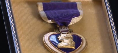 U.S. Army veteran James Mooney of Everett was reunited with his medal by State Treasurer Deb Goldberg.