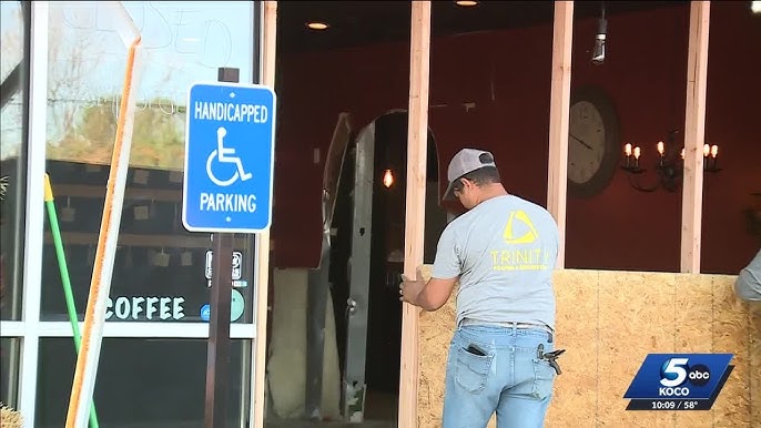 A car crashed into a coffee shop in Harrah after the driver claimed her foot got stuck on the gas pedal