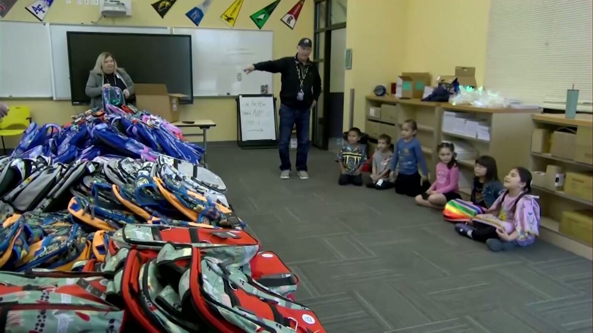 Warm Springs students receive backpacks filled with supplies and support