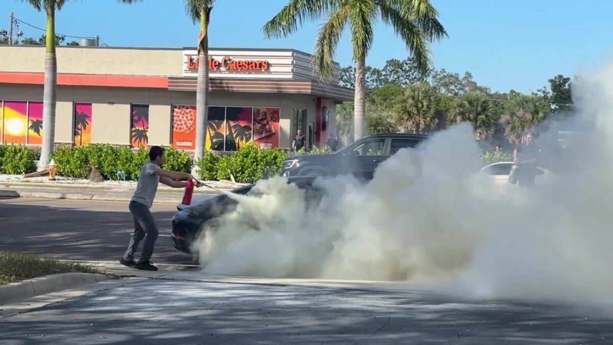A man was rescued by good Samaritans in Clearwater after his car caught fire.