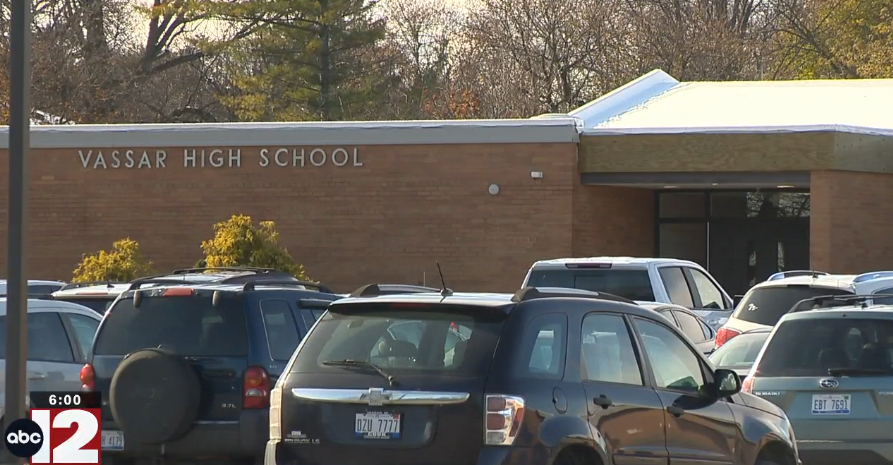 Vassar school resource officer Patrick Hammill was reassigned after an incident caught on camera shows him detain a student who left campus.