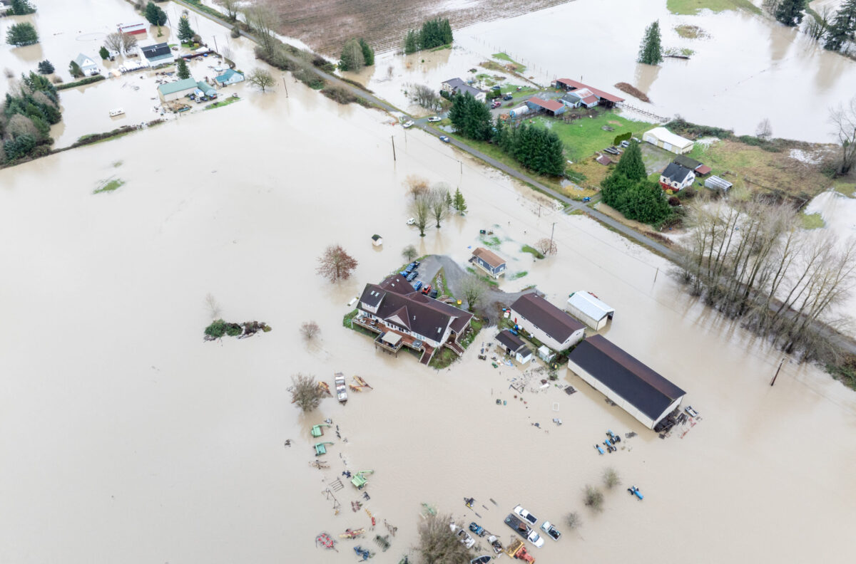 Tens of thousands ordered to flee flooding after torrential rain in Pacific Northwest
