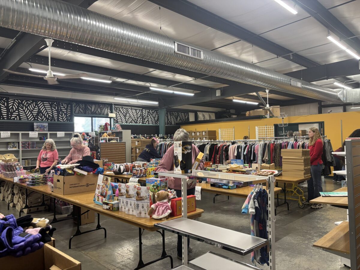 Volunteers prepare Adopt-A-Family Gift Room ahead of Wednesday opening