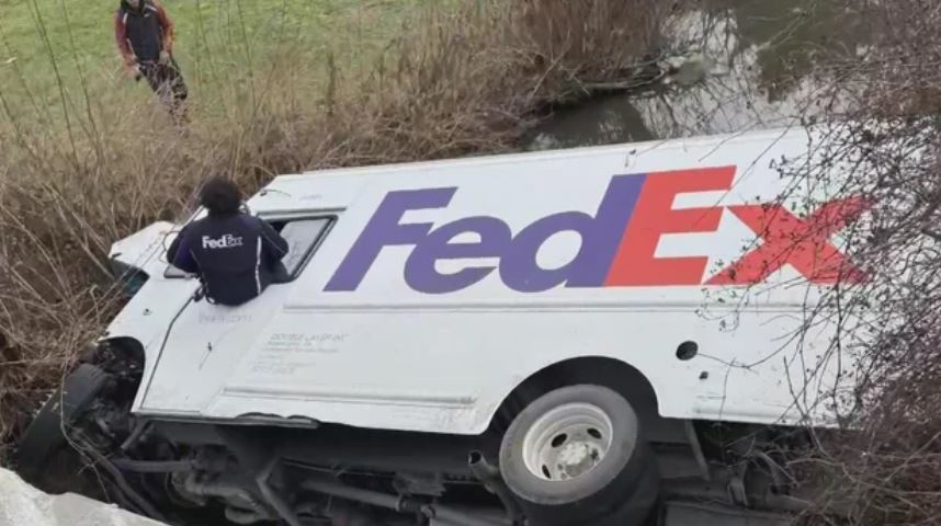 The driver of a FedEx truck crashed into a creek in Washington County on Dec. 1
