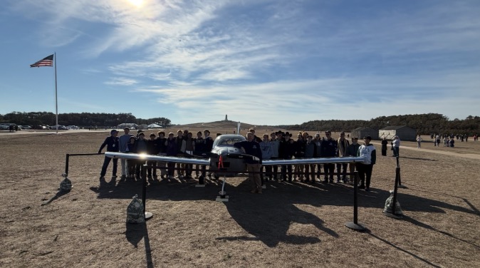 The students and graduates unveiled their plane at the annual ceremony December 17