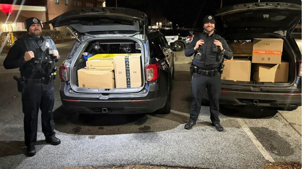 Billerica police officers delivered Amazon packages found on the side of the road.