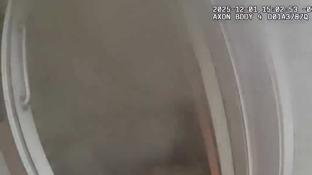 Body camera footage shows the tense moments as deputies rescue a child from a burning home in Raymond