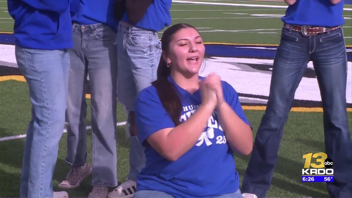 Florence High School receives the Qdoba Friday Night Blitz Spirit Award plaque