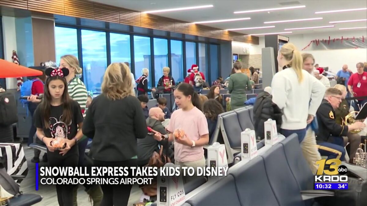 Families who lost a parent to military combat board Snowball Express for free trip to Disney