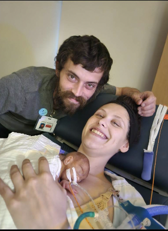 The Hasllam's holding onto their baby boy Axel