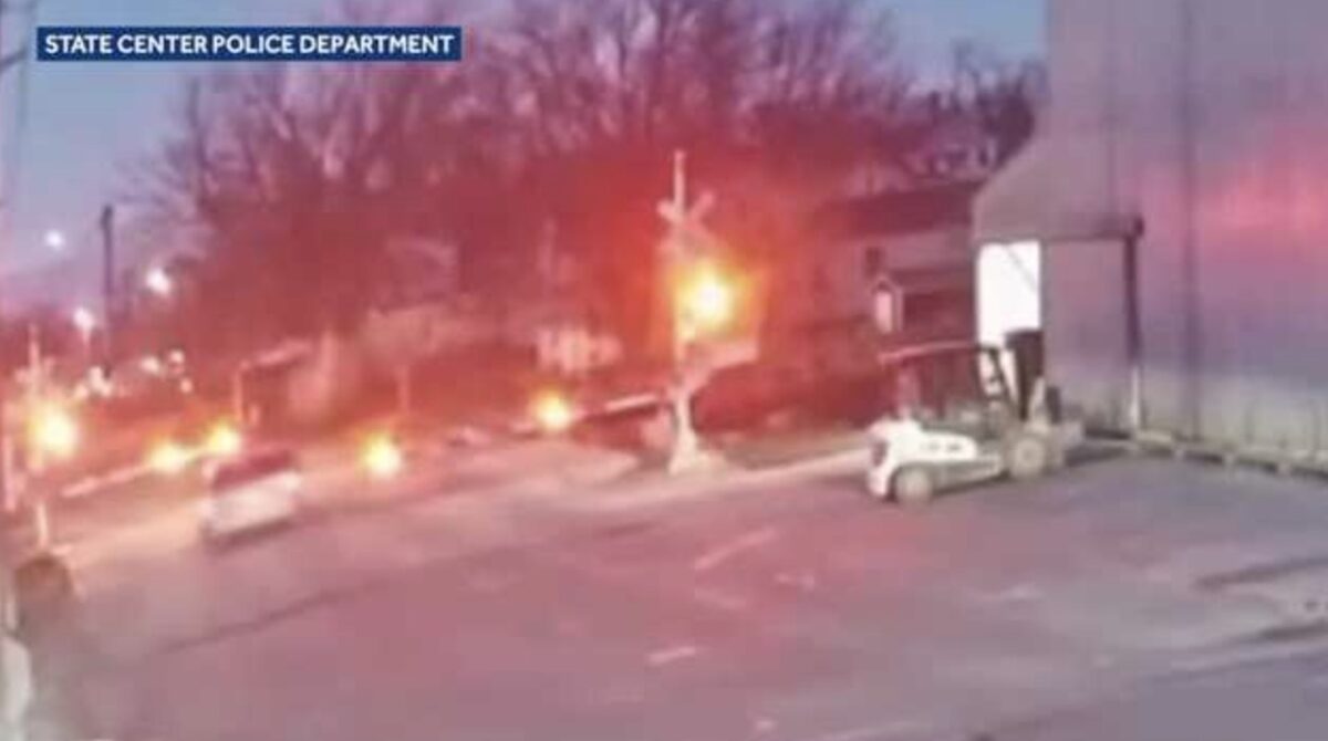 A van narrowly avoided a train collision in Marshall County after crossing tracks despite warning signals