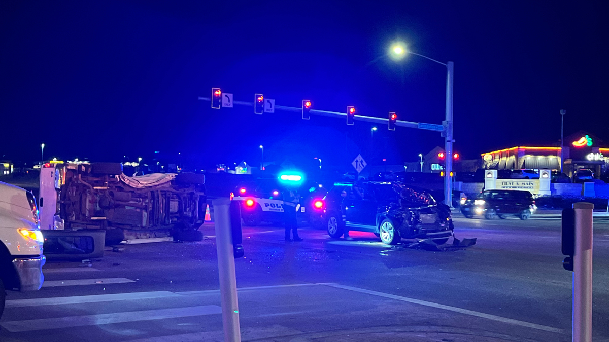 Rollover crash closes Constitution Avenue at Powers Boulevard intersection