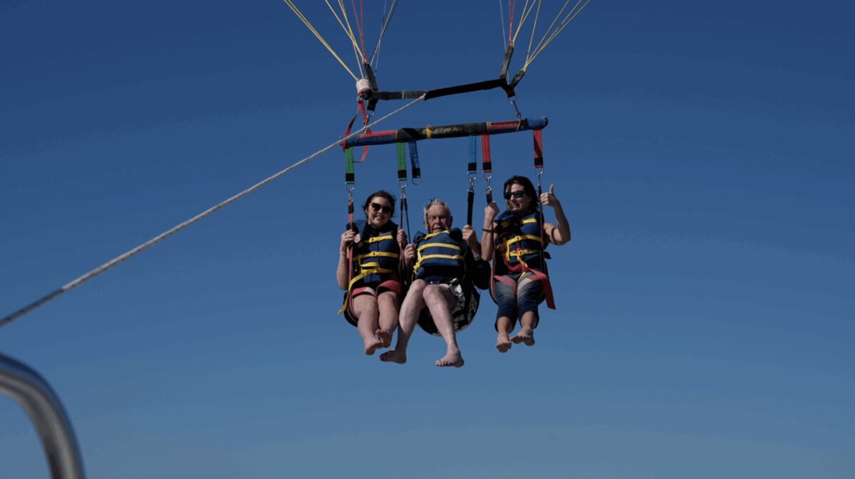 Arnold 'Sonny' Lokken goes parasailing with his granddaughter and doctor off the coast of Fort Myers Beach