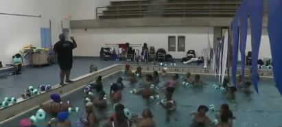 The instructor of a water aerobics class in Baltimore calls the non-traditional workout "Big Energy