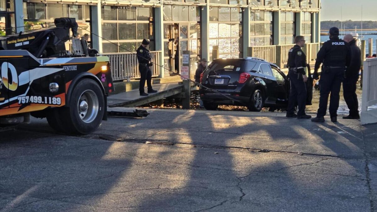 A woman was rescued after driving her car into the water near the Back Deck and Bubba's Seafood on Shore Drive in Virginia Beach on Friday afternoon